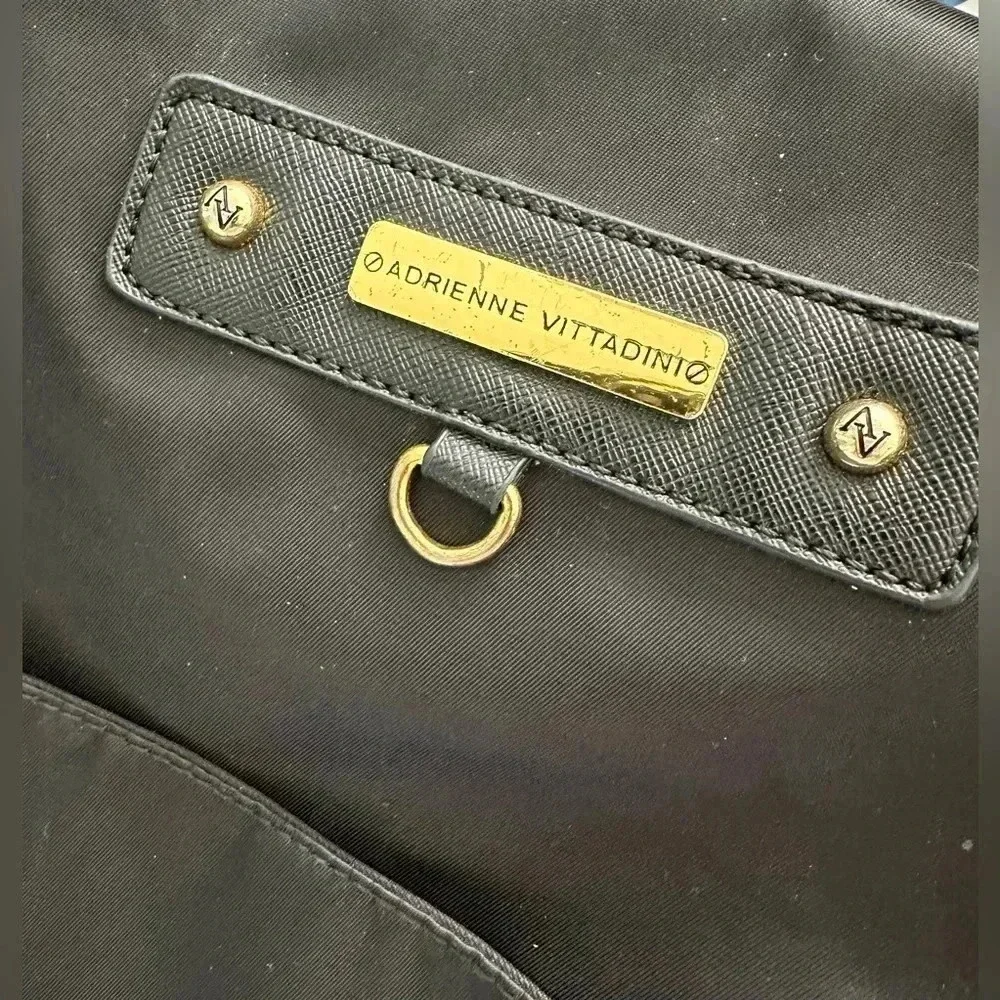 Adrienne Vittadini black nylon backpack and/or diaper bag adjustable straps‎